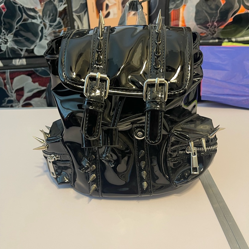 Dolls Kill Black Mini Spiked Patent Backpack